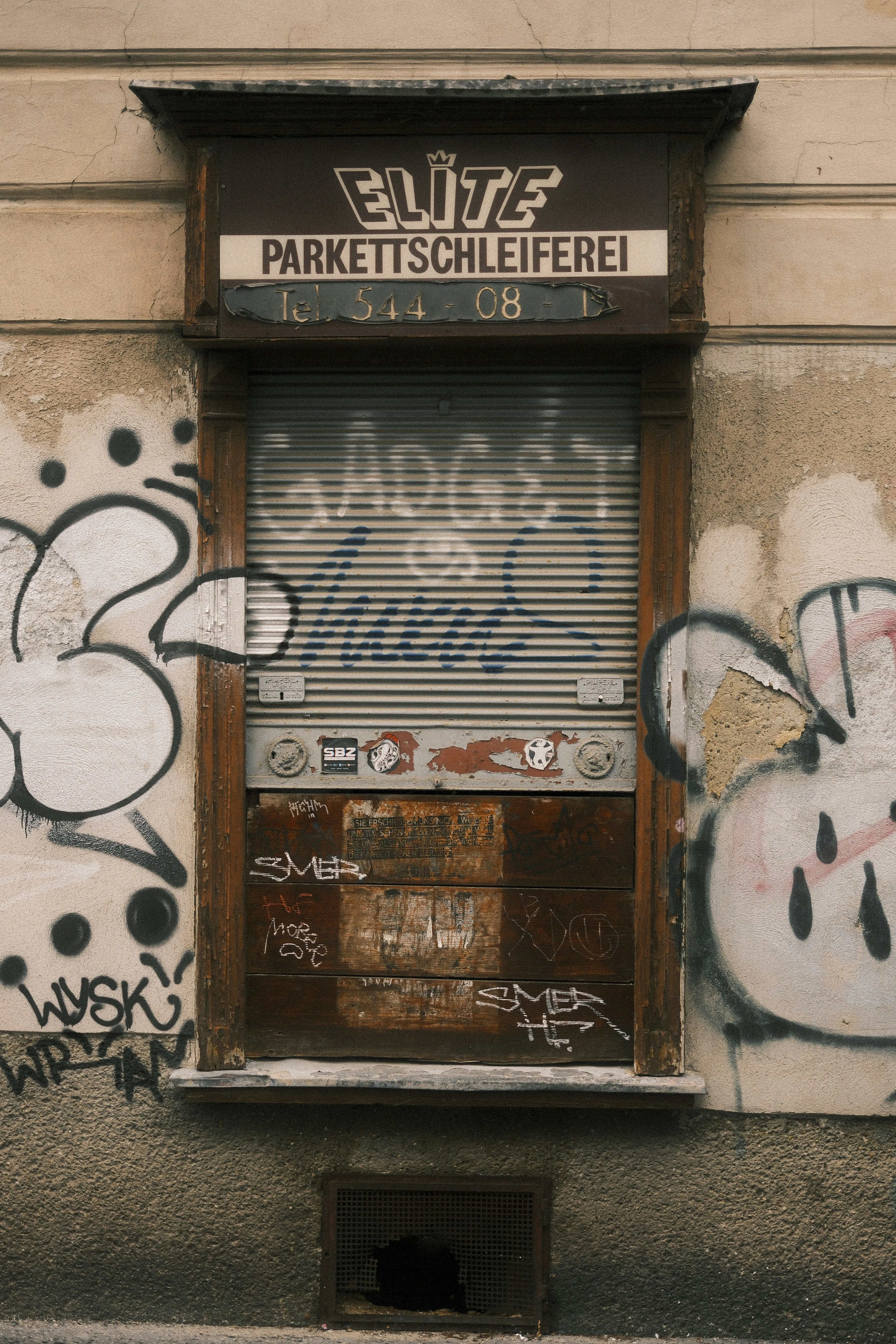 Old storefront with graffitis