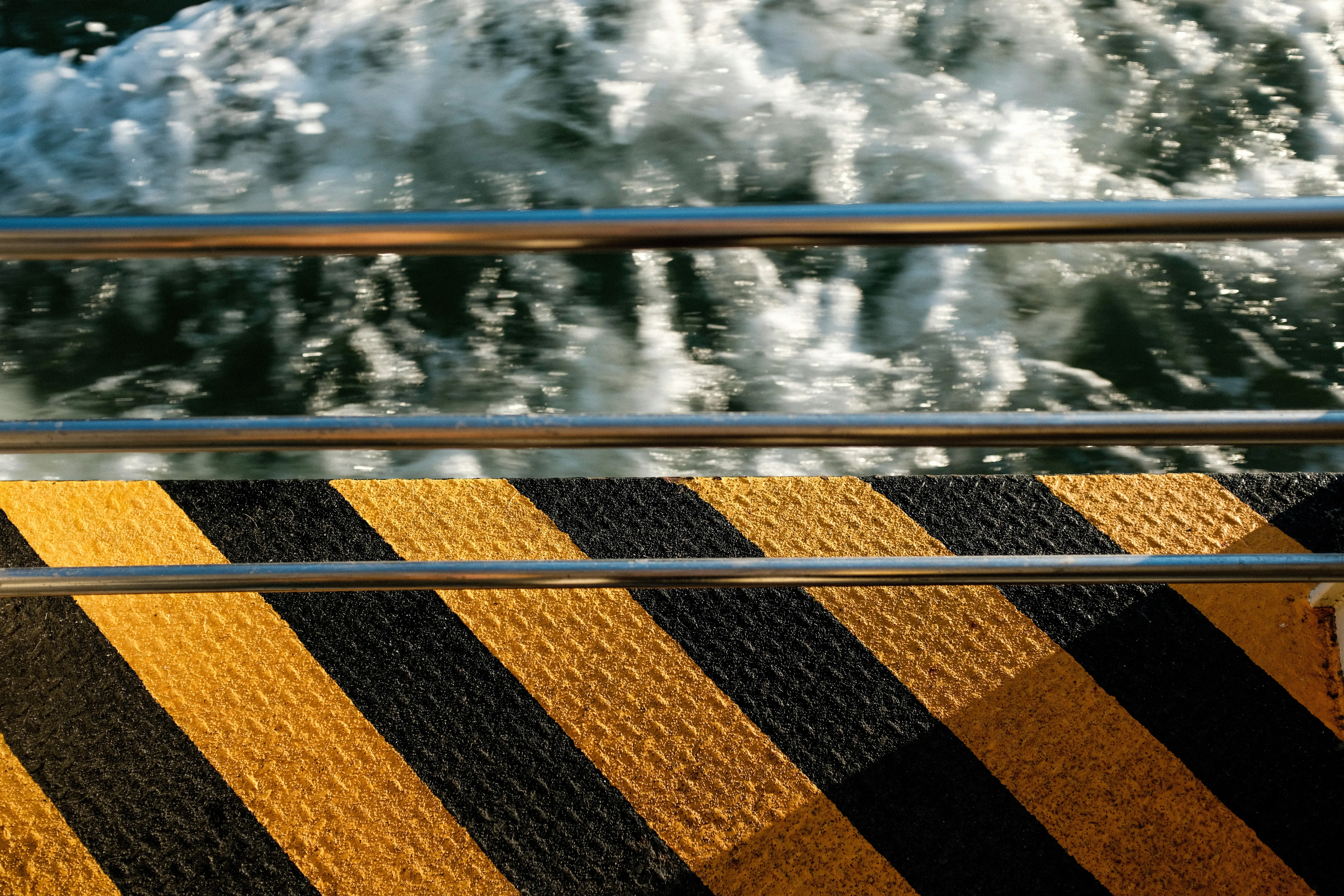 water passing by while being on a vaporetto in venice